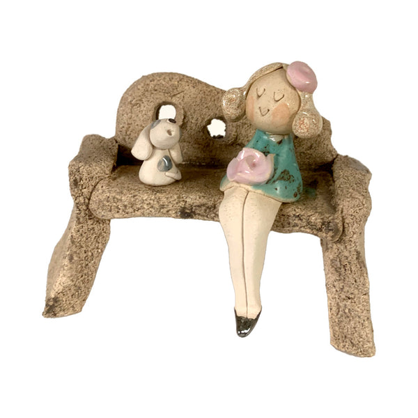 Sweet Girl in Mint Dress with Dog Sitting on Bench by Anka Christof
